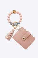 "Accessorize in Style: 2-Pack Mini Purse Tassel Key Chain by Burkesgarb"