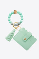 "Accessorize in Style: 2-Pack Mini Purse Tassel Key Chain by Burkesgarb"
