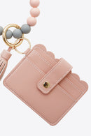 "Accessorize in Style: 2-Pack Mini Purse Tassel Key Chain by Burkesgarb"