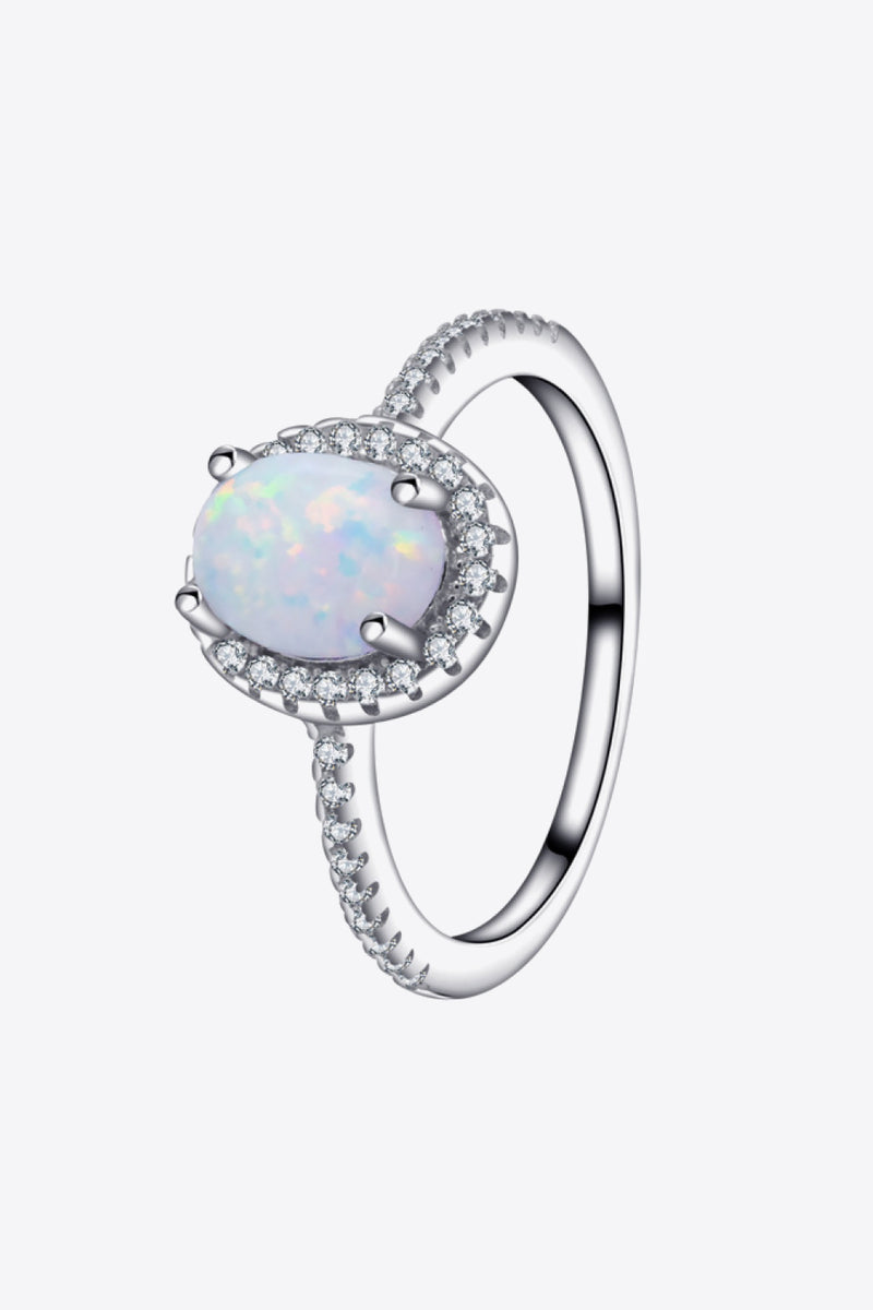 Ethereal Opulence: Opal 925 Sterling Silver Halo Ring at Burkesgarb