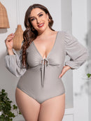Flattering and Chic: Plus Size Tied Deep V Balloon Sleeve One-Piece Swimsuit | Burkesgarb