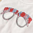 Playful and Vibrant: Graphic Top and Floral Pants Set for Babies