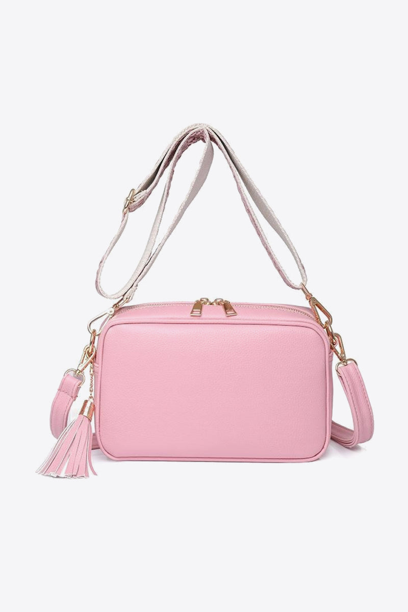 Chic and Stylish: Leather Tassel Crossbody Bag at Burkesgarb