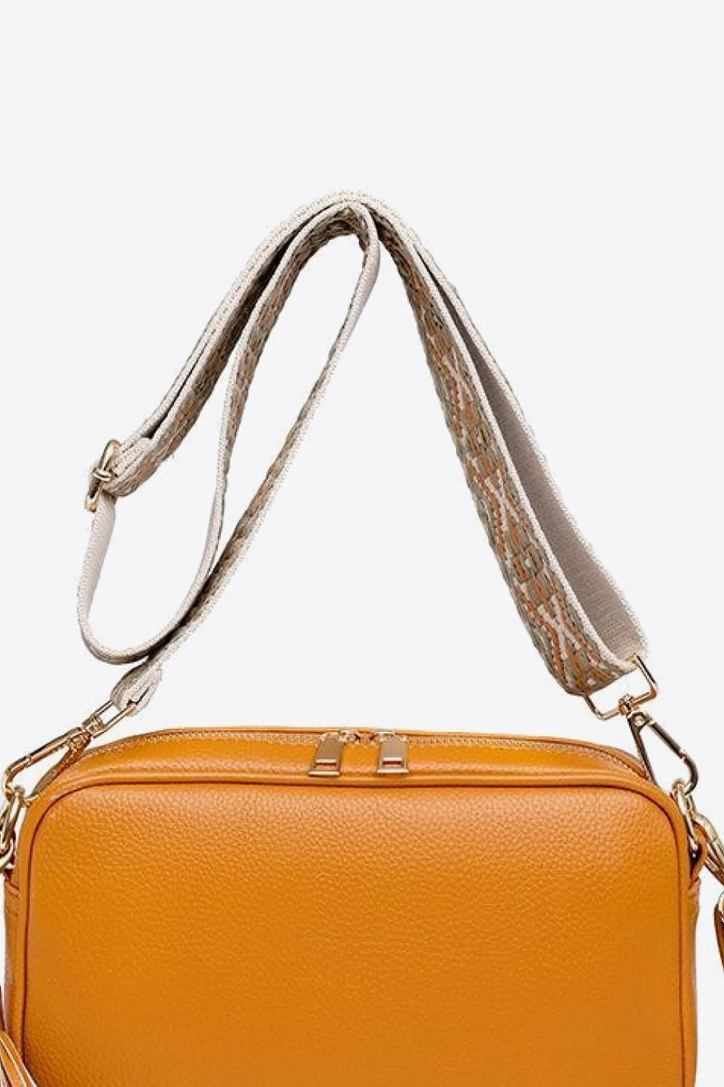 Chic and Stylish: Leather Tassel Crossbody Bag at Burkesgarb