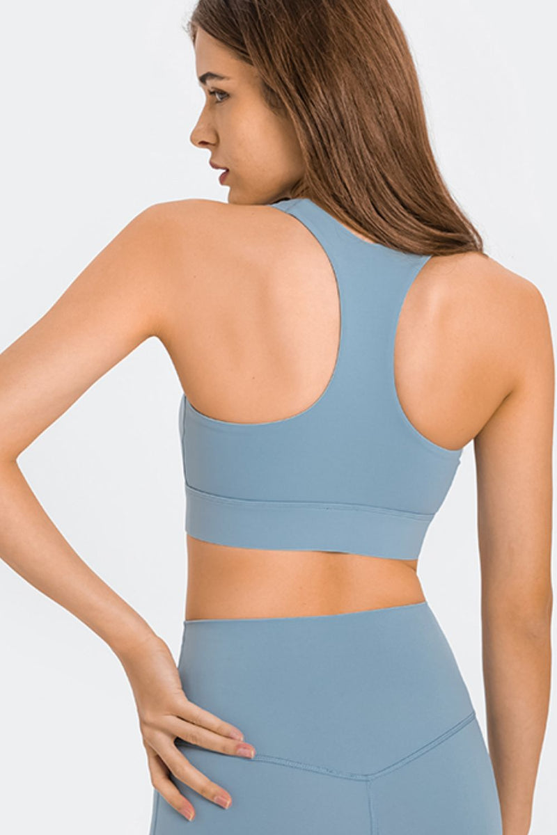 Experience Ultimate Support and Style with the Zip Up Racerback Sports Bra at Burkesgarb