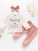 "Make a Statement with the Baby Girl Slogan Graphic Top and Joggers Set by Burkesgarb"
