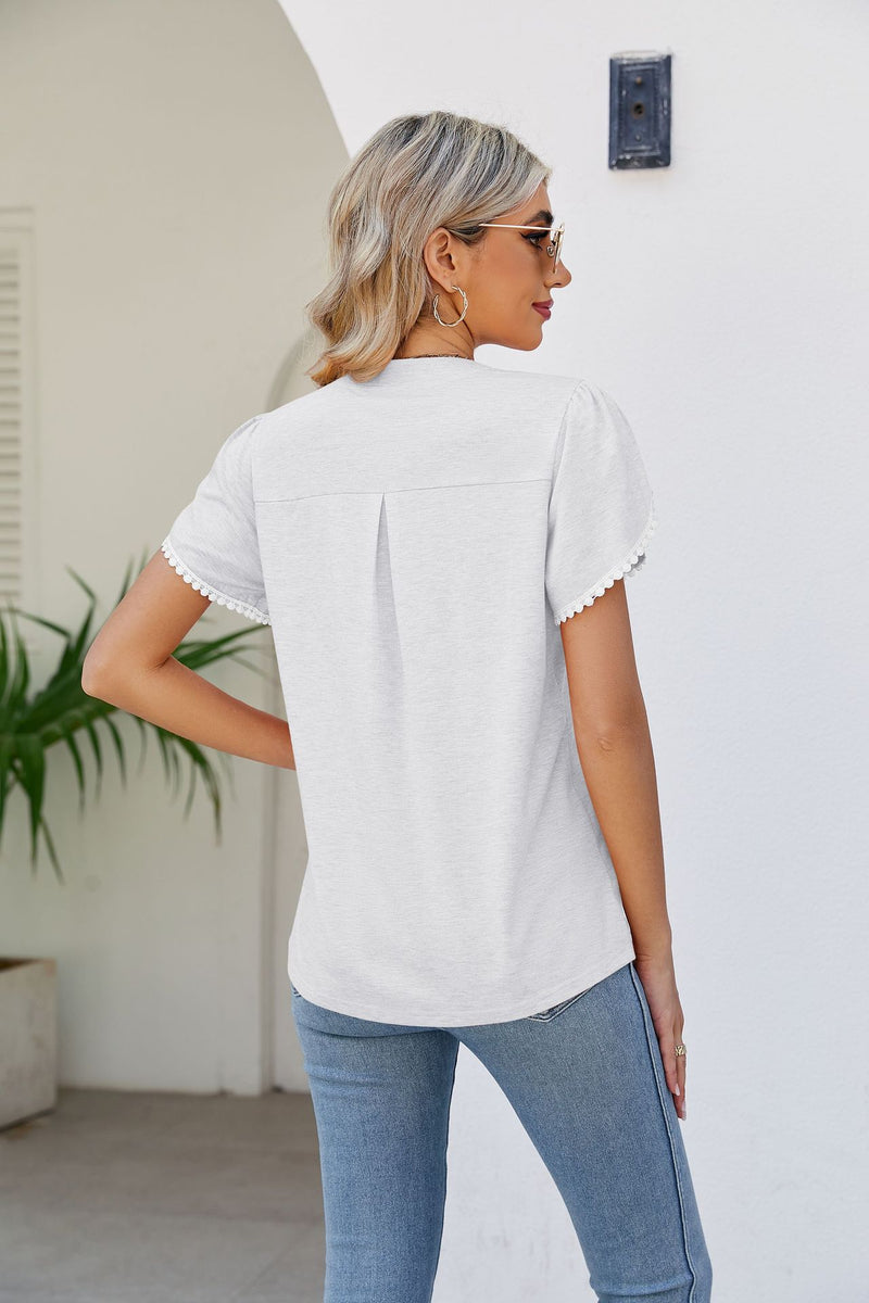 Embrace Feminine Elegance with our Petal Sleeve Notched Neck Top