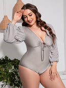 Flattering and Chic: Plus Size Tied Deep V Balloon Sleeve One-Piece Swimsuit | Burkesgarb