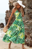 "Channel Your Inner Nature Lover with our Plants Print Halter Neck Dress"