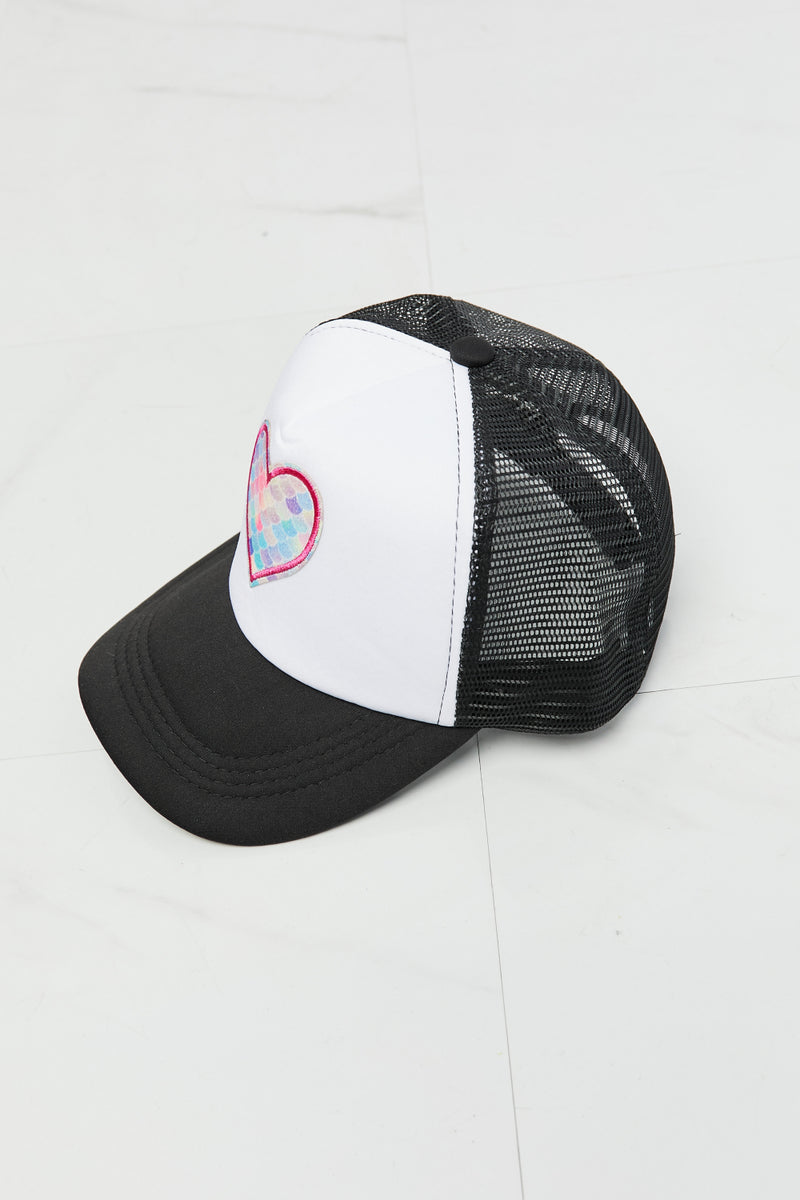 "Cool and Playful: Black Trucker Hat with Heart by Burkesgarb | Stylish and Trendy Women's Accessory"