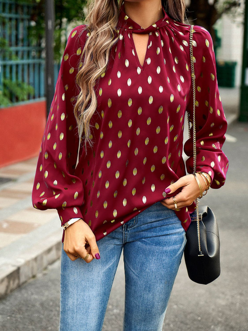 Elegant and Trendy: Mock Neck Cutout Lantern Sleeve Blouse at Burkegarb