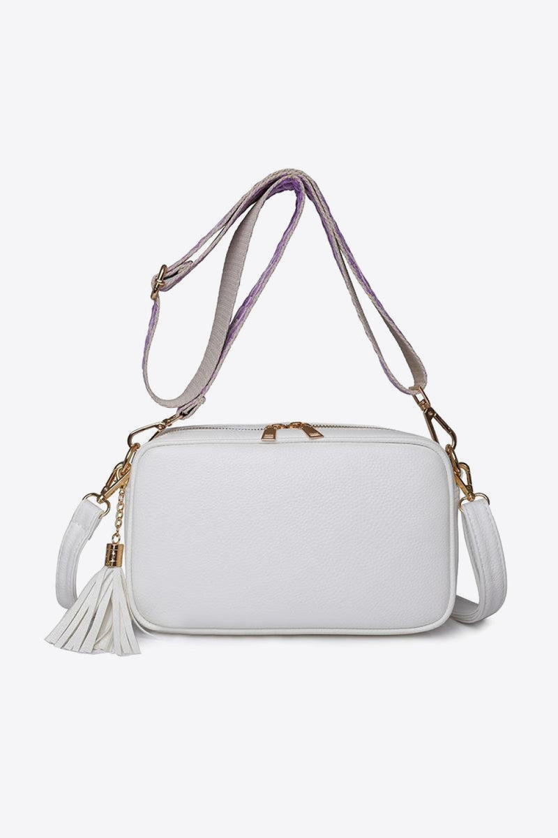 Chic and Stylish: Leather Tassel Crossbody Bag at Burkesgarb