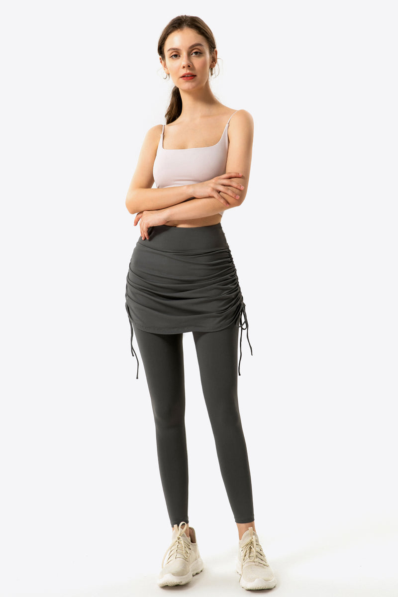 Elevate Your Wardrobe with Drawstring Ruched Faux Layered Yoga Leggings at Burkesgarb