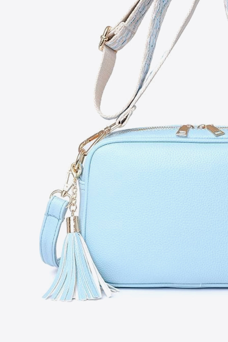 Chic and Stylish: Leather Tassel Crossbody Bag at Burkesgarb