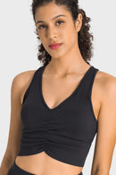 Stay Supported and Stylish with the Gathered Detail Halter Neck Sports Bra at Burkesgarb