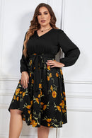 Elegance in Bloom: Plus Size Floral Print Midi Dress with Tie Belt