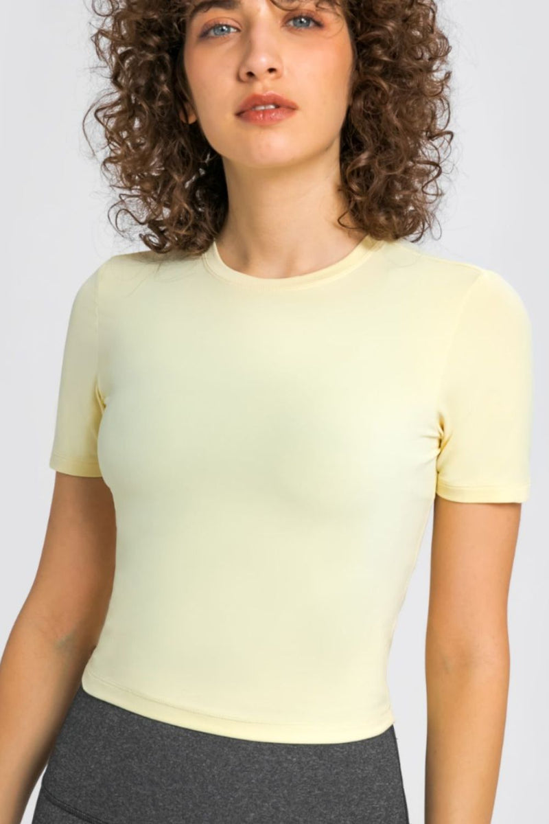 Stay Comfy and Stylish with the Round Neck Short Sleeve Yoga Tee at Burkesgarb