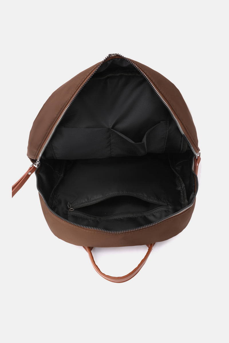 Effortless Style and Functionality with the Medium Nylon Backpack at Burkesgarb