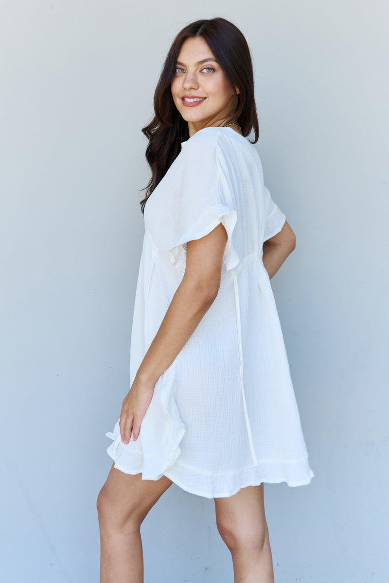 Embrace Effortless Elegance with our White Ruffle Hem Dress