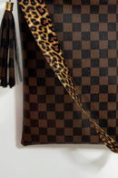 Stylish and Functional: Leather Shoulder Bag with Tassel at Burkesgarb