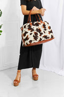 Travel in Style with the Cow Spots Plush Weekender Bag at Burkesgarb