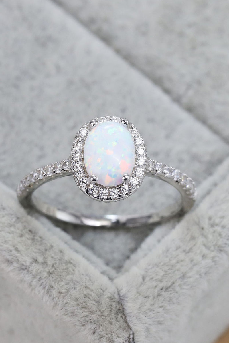 Ethereal Opulence: Opal 925 Sterling Silver Halo Ring at Burkesgarb