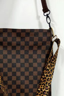 Stylish and Functional: Leather Shoulder Bag with Tassel at Burkesgarb