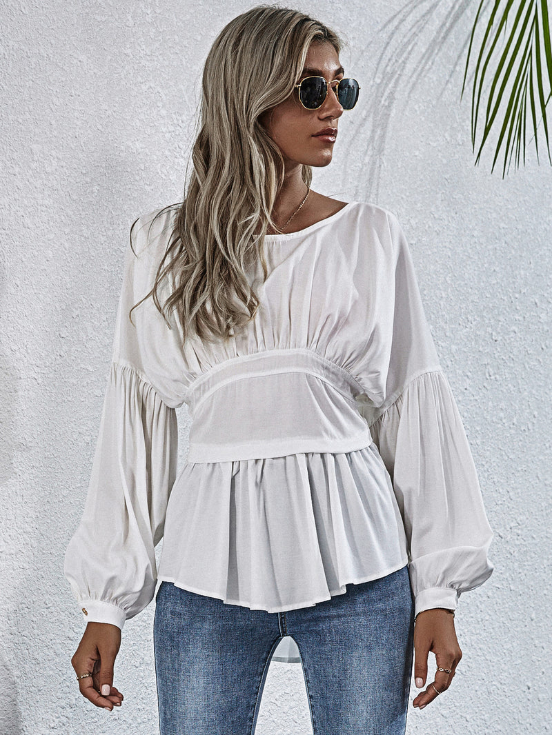 Effortless Style: Exposed Seams Round Neck Blouse at Burkesgarb