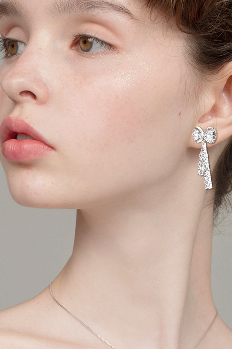 Elegant Sparkle: 1.12 Carat Moissanite Bow Earrings at Burkesgarb