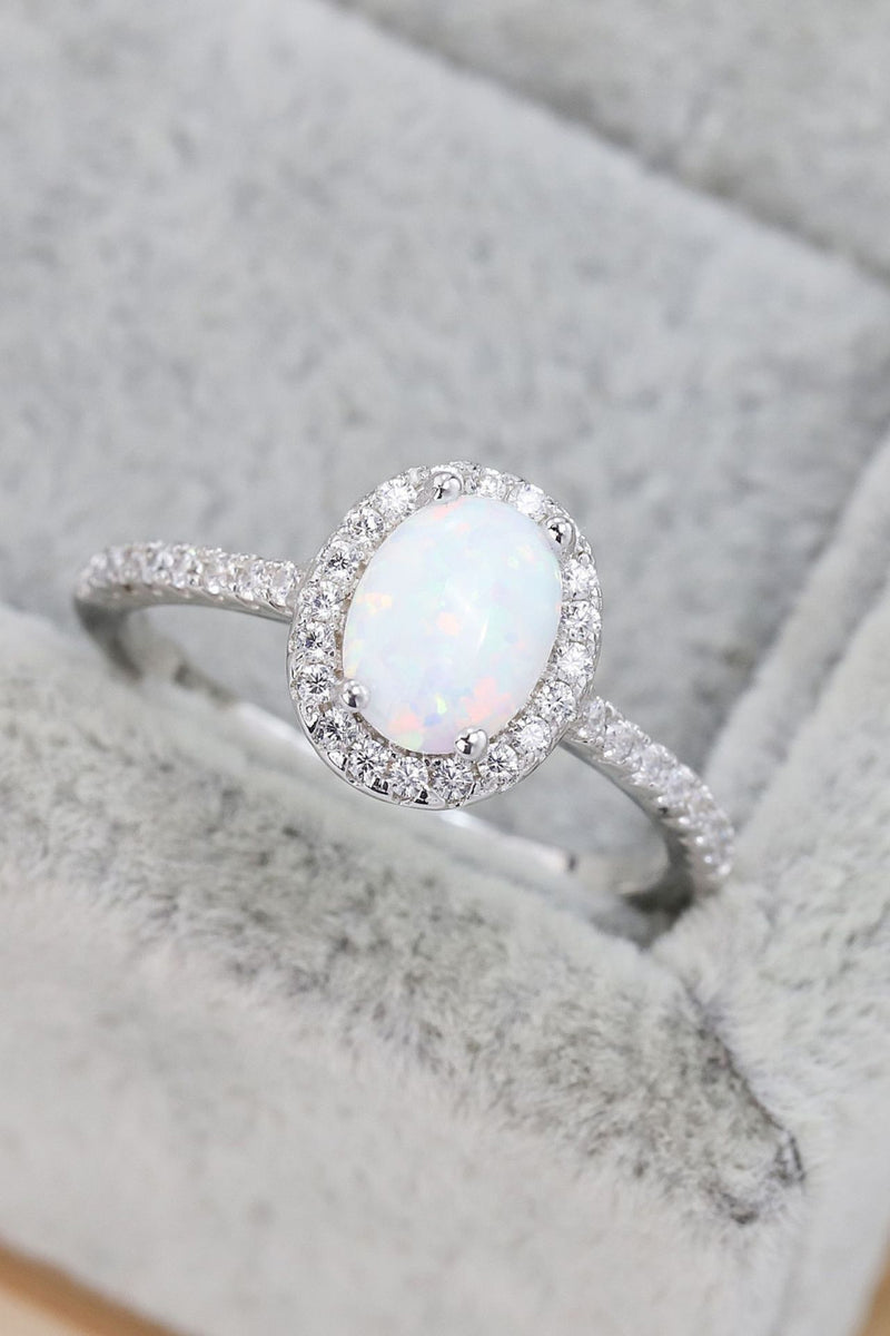 Ethereal Opulence: Opal 925 Sterling Silver Halo Ring at Burkesgarb