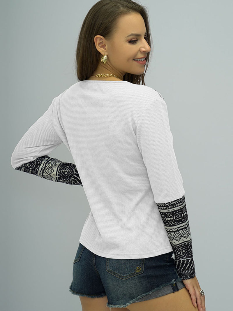 Chic and Playful: Printed Round Neck Buttoned Shoulder Tee at Burkesgarb