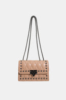 "Edgy and Chic: Studded Leather Crossbody Bag at Burkesgarb
