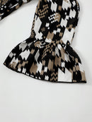 Stand out with Style in the Cold-Shoulder Flare Leg Jumpsuit from Burkesgarb