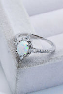 Radiant Beauty: Platinum-Plated Opal and Zircon Ring at Burkesgarb