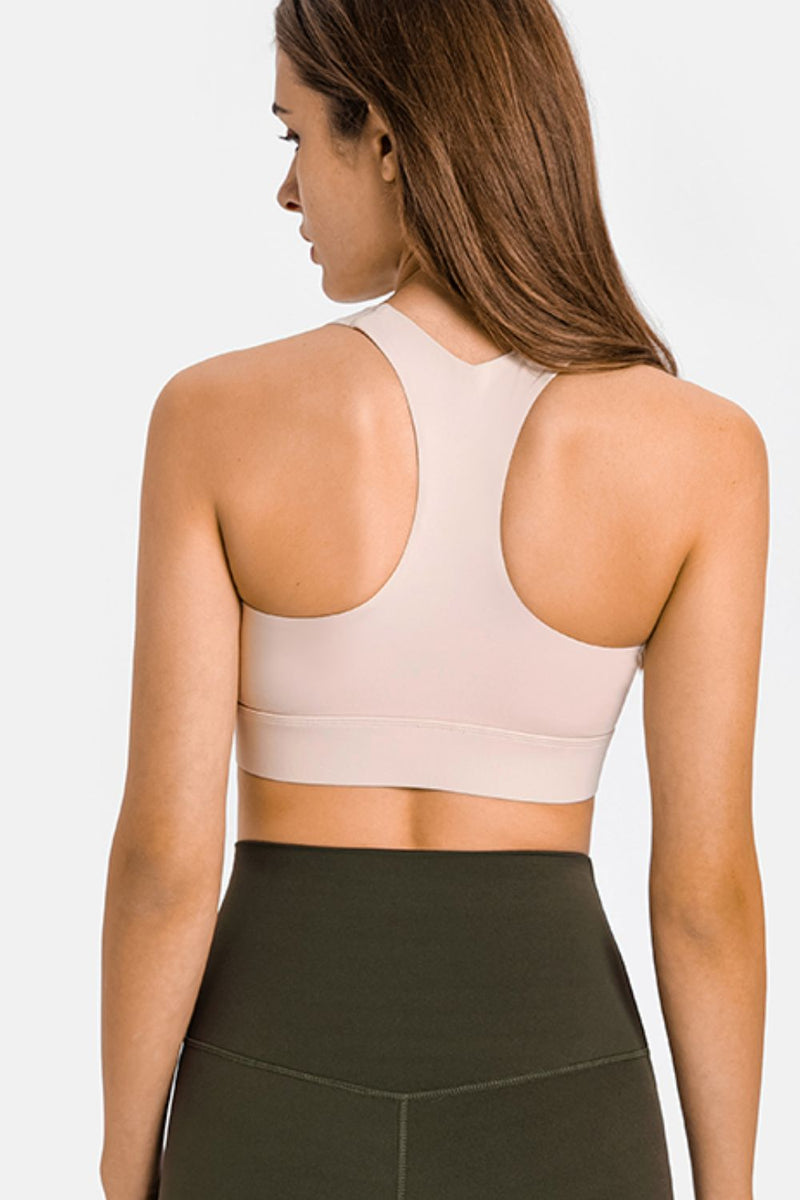 Experience Ultimate Support and Style with the Zip Up Racerback Sports Bra at Burkesgarb