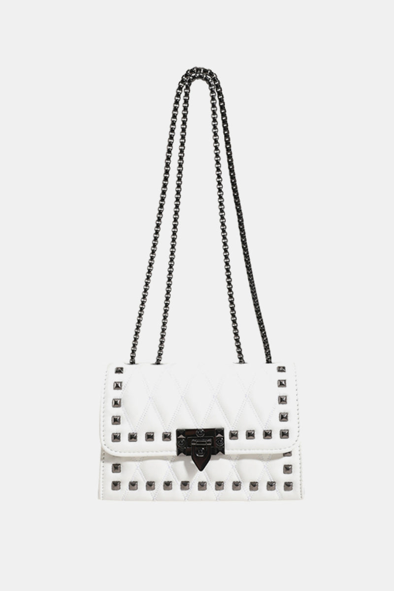 "Edgy and Chic: Studded Leather Crossbody Bag at Burkesgarb