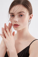 Elegant Sparkle: 1.12 Carat Moissanite Bow Earrings at Burkesgarb