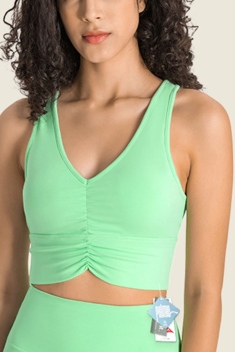 Stay Supported and Stylish with the Gathered Detail Halter Neck Sports Bra at Burkesgarb