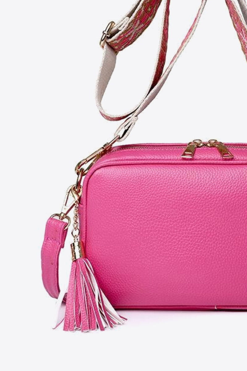 Chic and Stylish: Leather Tassel Crossbody Bag at Burkesgarb