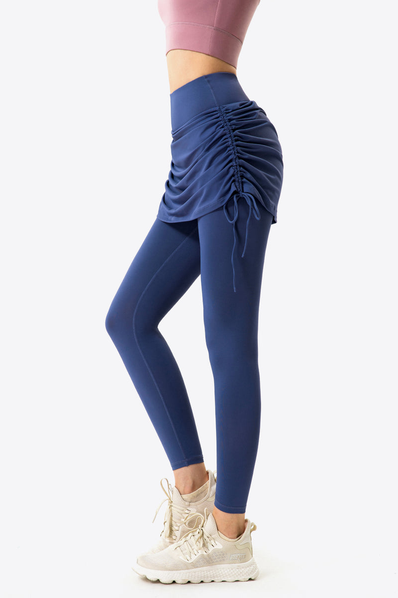 Elevate Your Wardrobe with Drawstring Ruched Faux Layered Yoga Leggings at Burkesgarb