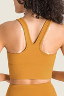 Stay Supported and Stylish with the Gathered Detail Halter Neck Sports Bra at Burkesgarb