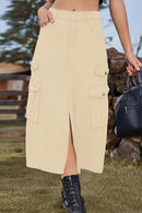 Fashionably Chic: Slit Front Denim Skirt with Pockets at Burkesgarb