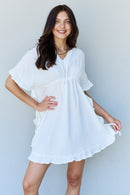 Embrace Effortless Elegance with our White Ruffle Hem Dress