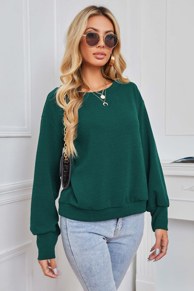 Elevate Your Winter Wardrobe with the Round Neck Dropped Shoulder Pullover Sweater at Burkesgarb