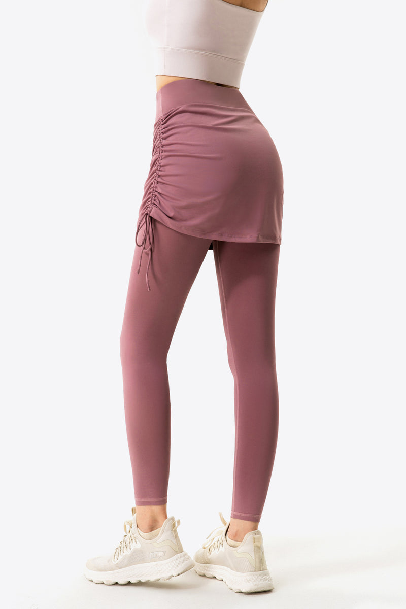 Elevate Your Wardrobe with Drawstring Ruched Faux Layered Yoga Leggings at Burkesgarb