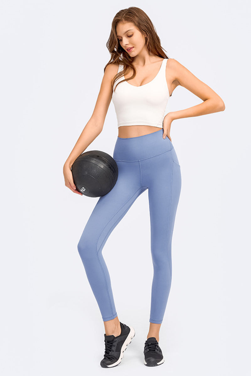 Enhance Your Workout Style with the Deep V-Neck Crop Sports Bra at Burkesgarb