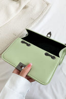 "Edgy and Chic: Studded Leather Crossbody Bag at Burkesgarb