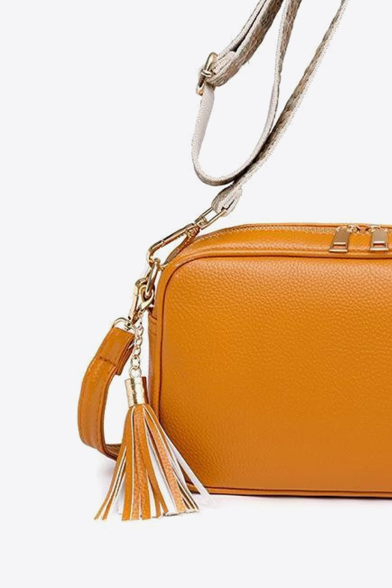 Chic and Stylish: Leather Tassel Crossbody Bag at Burkesgarb