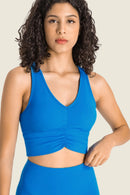 Stay Supported and Stylish with the Gathered Detail Halter Neck Sports Bra at Burkesgarb