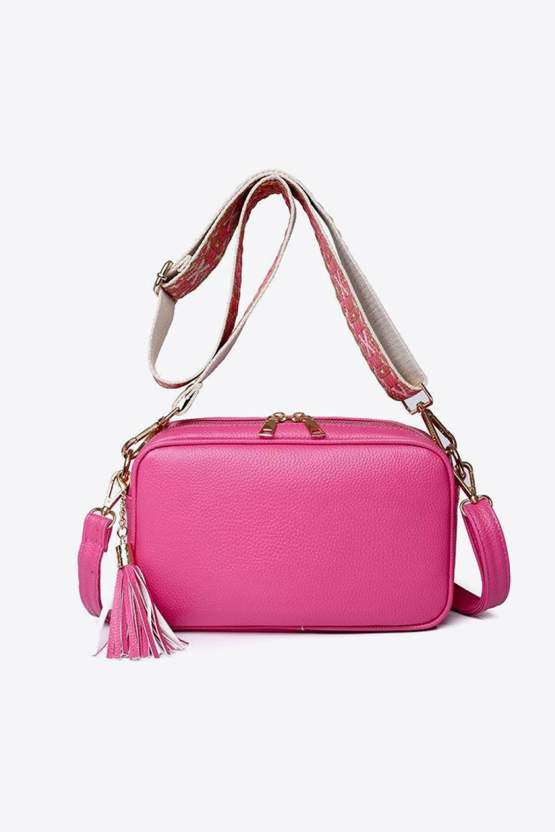 Chic and Stylish: Leather Tassel Crossbody Bag at Burkesgarb